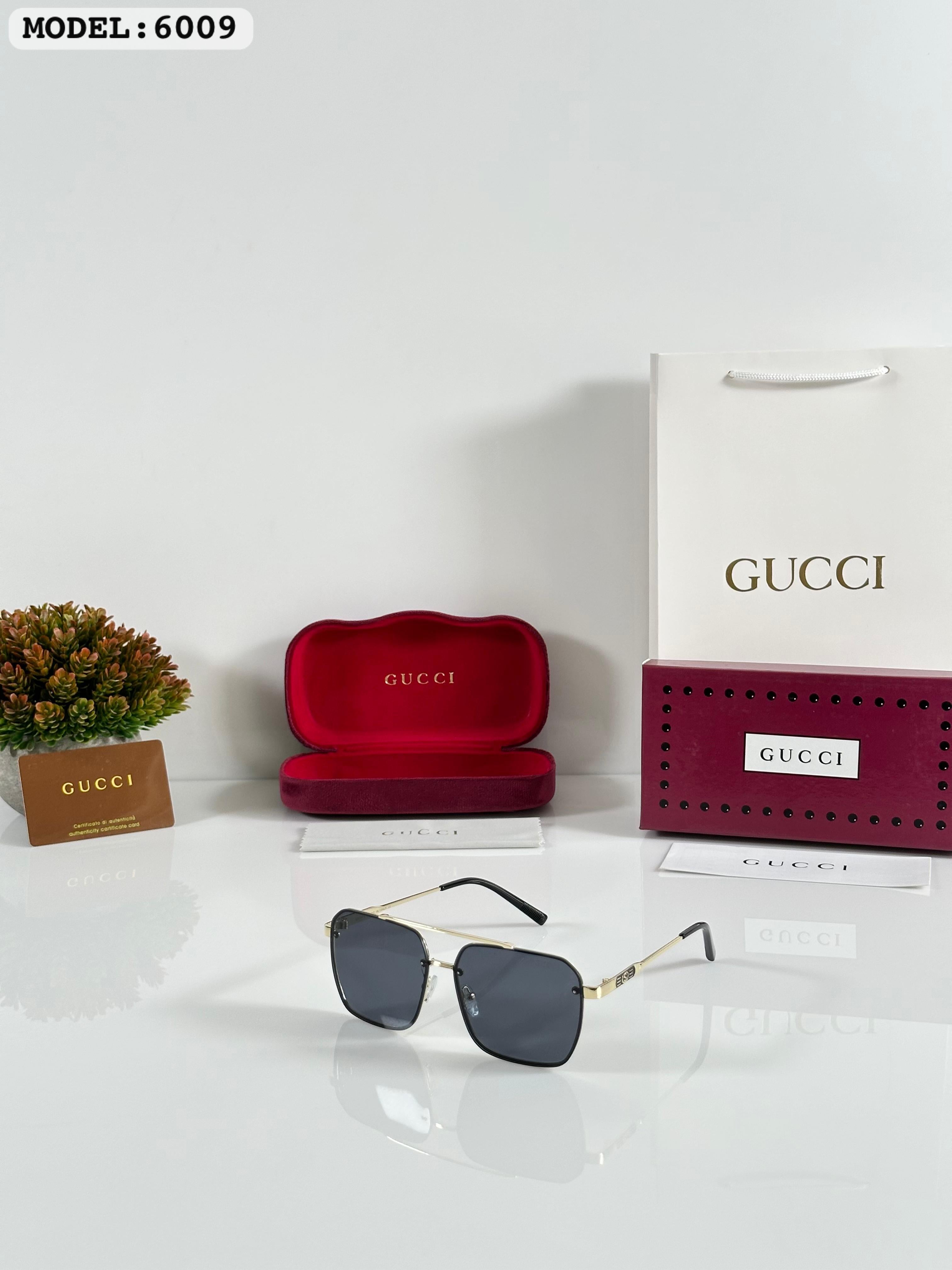 Gucci 6009 gold black