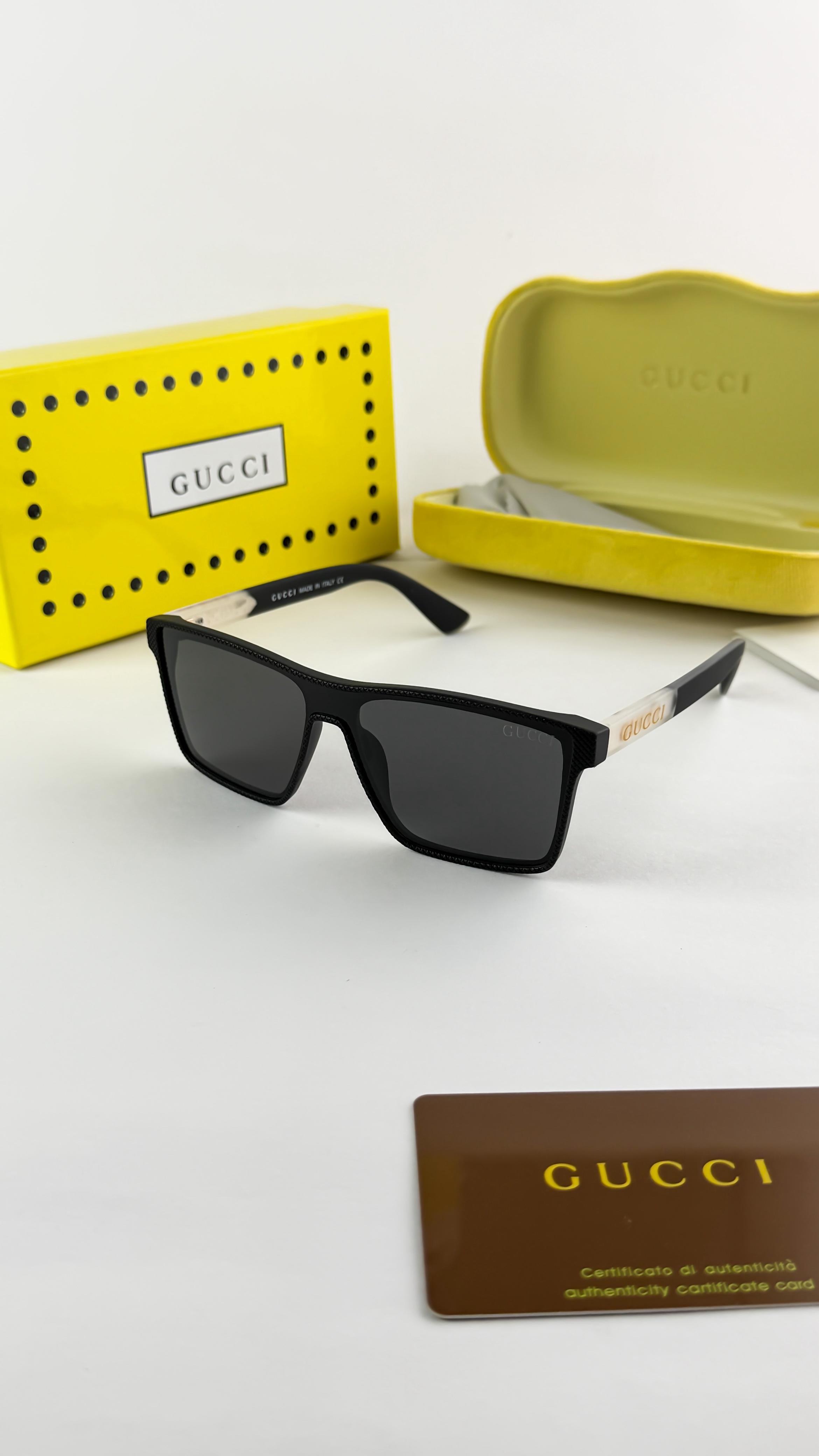 *GUCCI BLACK 2203. OUT STANDING ARTICLE